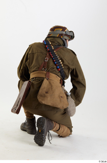 Photos Owen Reid WWI army holding gun kneeling whole body…